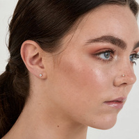 Gold Titanium Pigtail Nose Stud - Premium Crystal